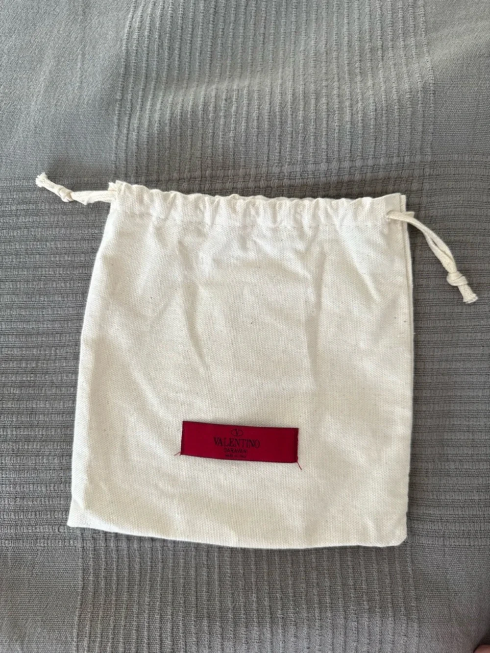 Valentino Garavani Cream Canvas Dust Bag with Red Logo Patch